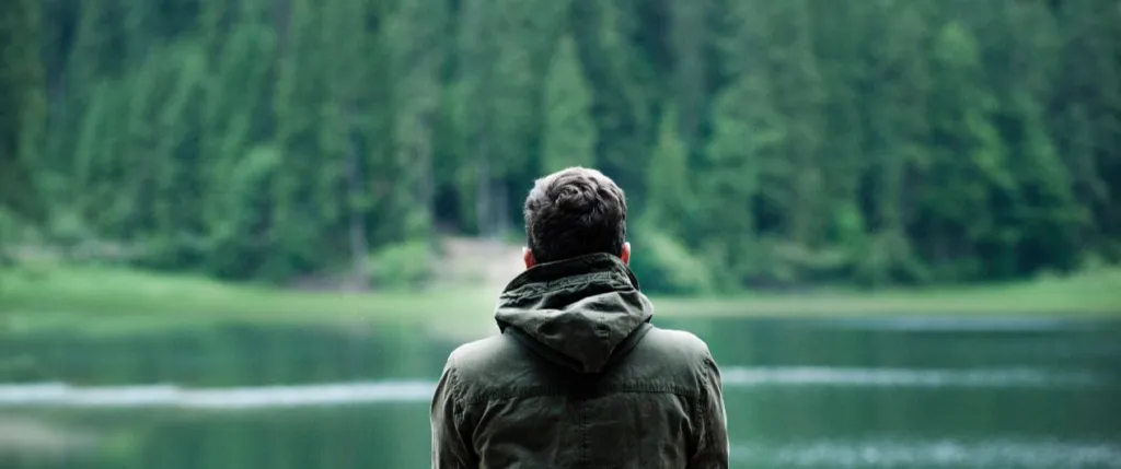 Person looking at a lake